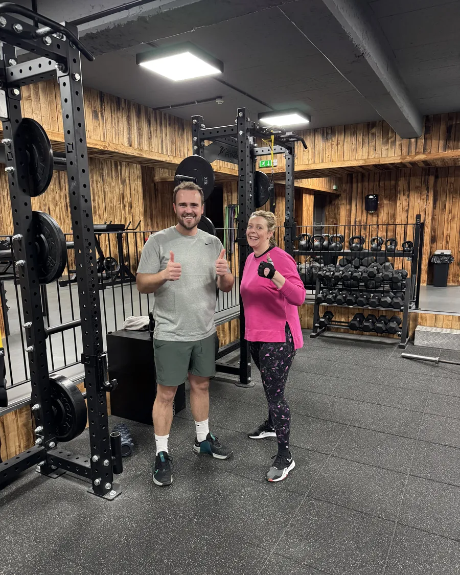 A coach and a member in the training room at Full Life Fitness in Dursley